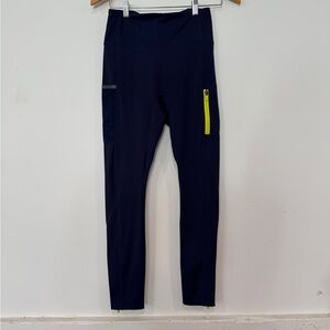 Fabletics Motion365 high waisted Navy legging with Neon Yellow Zip Accent
